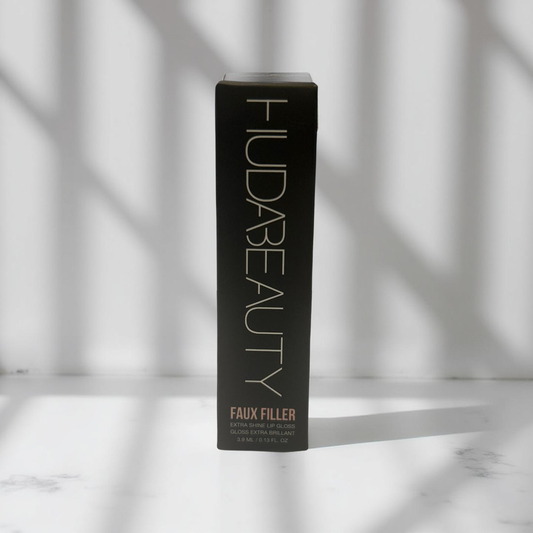 Huda Beauty Faux Filler Lip Gloss in Shade Honey