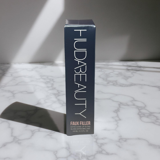 Huda Beauty Faux Filler Lip Gloss in Shade Sugar Baby